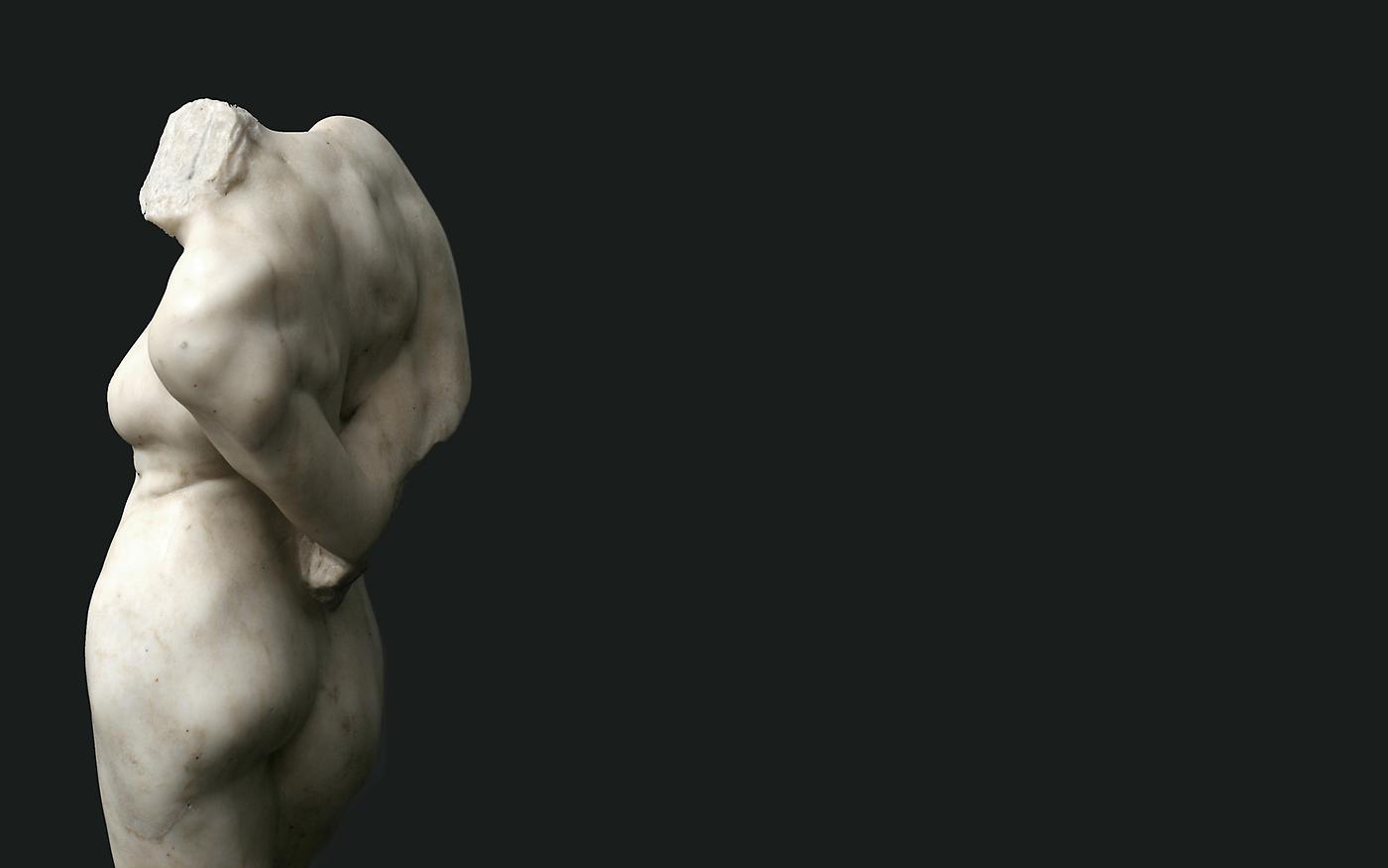 marble torso of a woman seen from rear